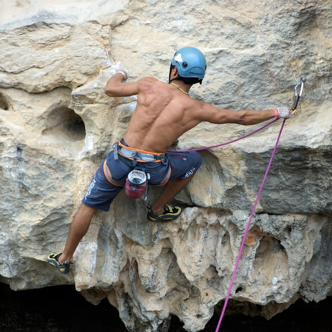 An indoor lead climber